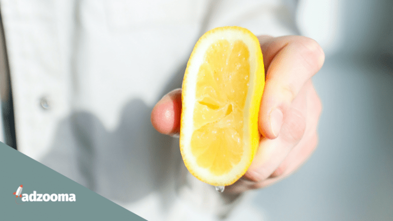 A man squeezing a lemon